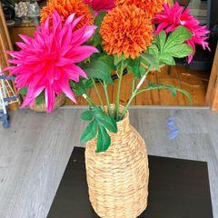 Wicker vase and faux flowers