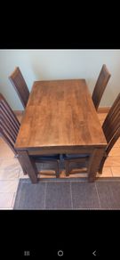 Wooden dining table and four chairs