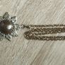 Vintage pendant on a long chain. Image 4