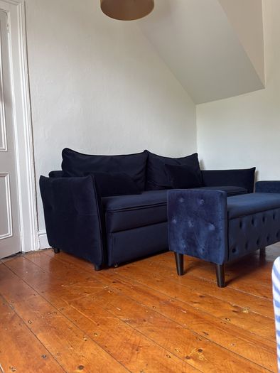 Navy velvet couch with matching Ottoman. Perfect condition