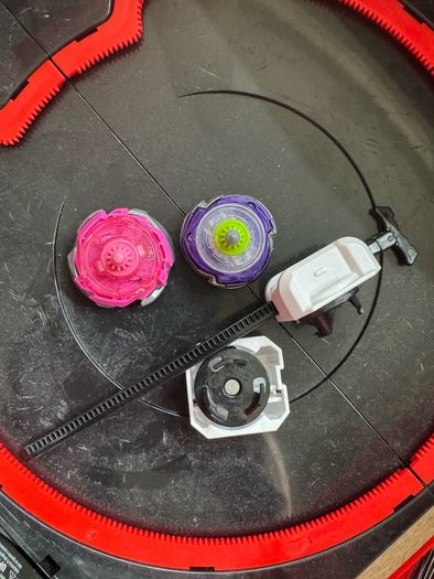 Beyblade stand with 2 beyblades