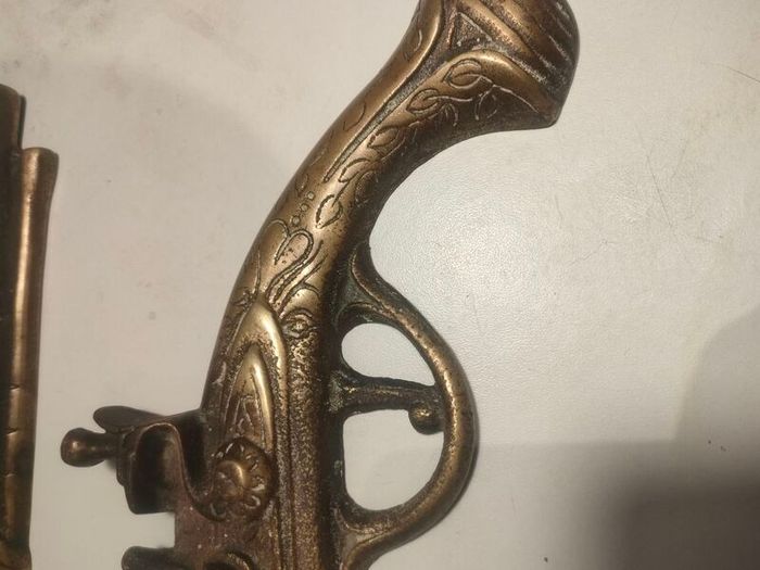 A pair of Early 20th Century 13" Brass Flintlock pistols
