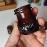 143 - Set of 4 Vintage 2oz Bovril Dark Brown Glass Embossed Letters Collectible Decorative Jars Image 8
