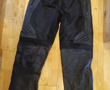 Brand new Icon leather motorcycle overpant adjustable between 38 and 42 waist