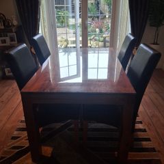 Stunning table and 4 leather chairs and matching units
