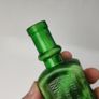 396 - Antique Aceite De Bellotas y Savia De Coco Green Glass Bottle Image 3