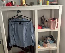 Open clothes rail and shelves