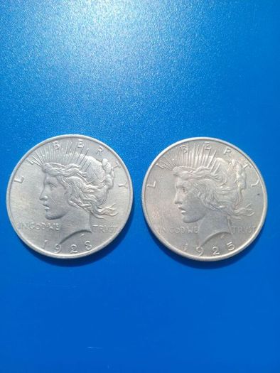 Coins peace dollars