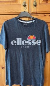ELLESSE  T-shirt. Size small / medium. Great Quality & In Excellent Condition. Weighty 100% cotton.