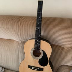 Martin smith half size guitar needs stings hence price