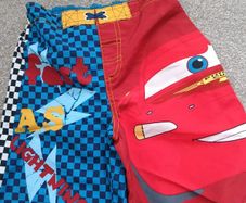 NEW.boy's swim shorts. Age 5.H 110/116
