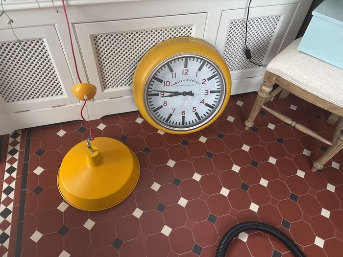 large clock and pendant light