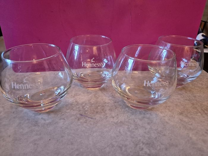 A Set of 4 Hennessy Cognac Glasses Branded with the Hennessy Cognac Logo