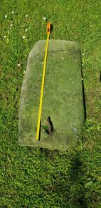 Antique agricultural drill stone.
