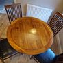 Round wooden table and four chairs Image 5