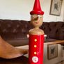 Vintage Tall Wooden Pinocchio Coin Bank with Lock and Keys Red Hand Painted Italy 29 cm Image 4