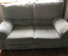 Natuzzi matching sofas. 3 + 2 seaters.  Good condition.  Colour aquamarine. Photos don't do justice to colour due to light.