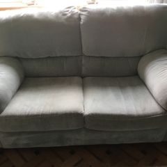 Natuzzi matching sofas. 3 + 2 seaters.  Good condition.  Colour aquamarine. Photos don't do justice to colour due to light.
