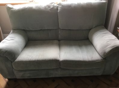 Natuzzi matching sofas. 3 + 2 seaters.  Good condition.  Colour aquamarine. Photos don't do justice to colour due to light.