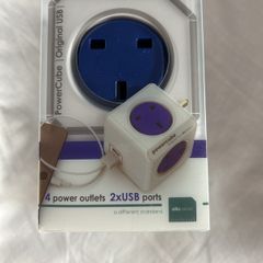 Adaptor PowerCube takes power supply and usb