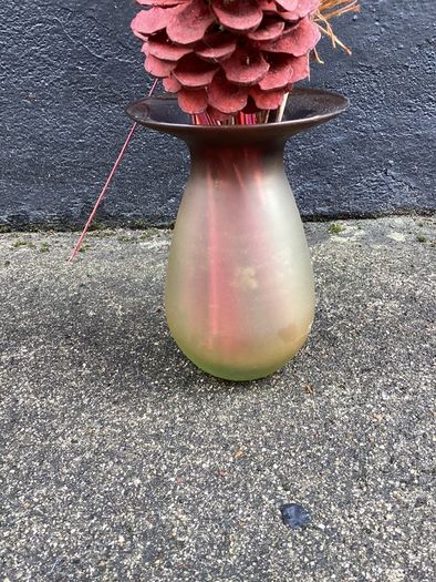 Dried flower arrangement in glass vase