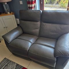 Small dark grey leather sofa for sale