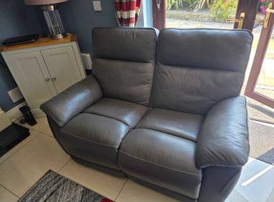 Small dark grey leather sofa for sale