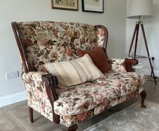Vintage floral two seater sofa and matching armchair