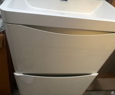 standing cabinet with sink and tap