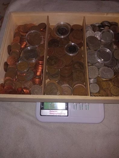 4 kg.coins+14 banknotes.