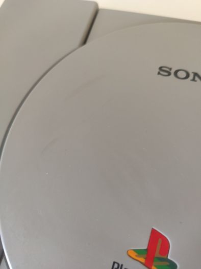 Playstation 1 console SCPH-7502 with games and cords