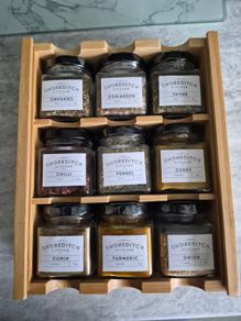 Spice rack with labelled jars