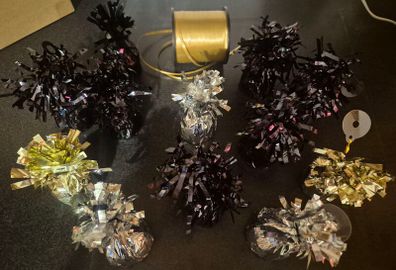 balloon weigths x12 and gold ribbon