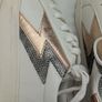 Runners in white with gold and grey lightning bolt on side Image 4