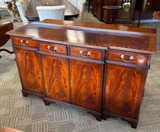Fabulous mahogany flamed four drawer / door sideboard with top lip
