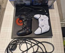 PS4 + 2 controllers and 13 games.