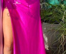 Stunning cerise satin debs dress, corset style. Size 8
