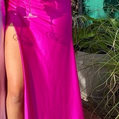 Stunning cerise satin debs dress, corset style. Size 8