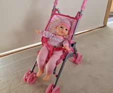 Baby buggy and doll