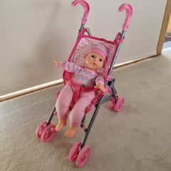Baby buggy and doll