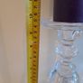 2 large glass candle sticks with candles Image 4