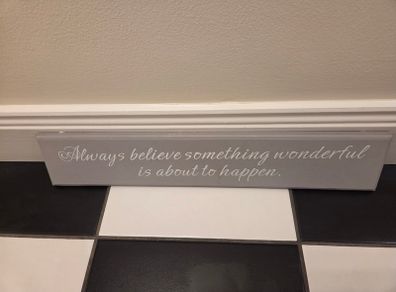 Always Believe something wonderful is about to happen wall sign
