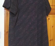 George short sleeve mini dress with a sparkly, multicolored pattern