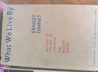 Hardcover book What We Live By by Ernest Dimnet