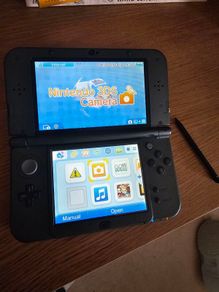 NEW 3DS XL (Used) + Charging cable