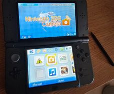 NEW 3DS XL (Used) + Charging cable