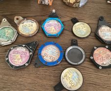 Motorbike tax disc holders