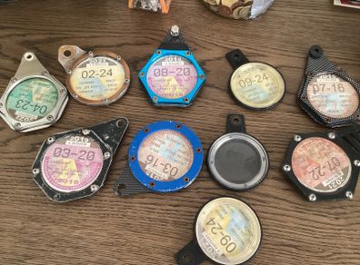 Motorbike tax disc holders
