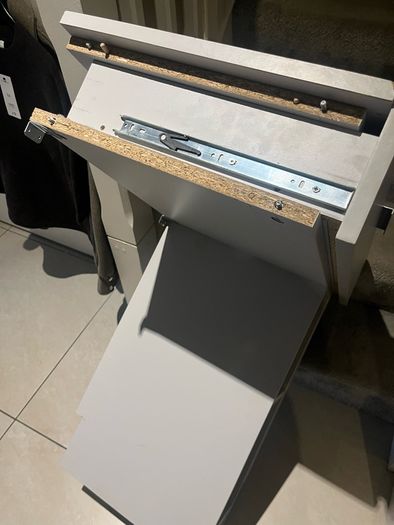 Grey dressing table needs repair