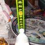 Old Ornament of a Boy in a Winter Hat and Light Colored Clothing on Skis, Made in Spain. Image 7
